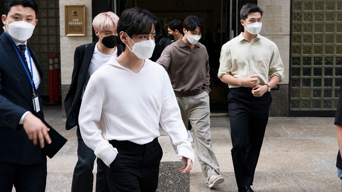 Members of the South Korean band BTS exit the South Korean Consulate during the 76th Session of the United Nations General Assembly in Manhattan, New York, U.S., September 21, 2021.