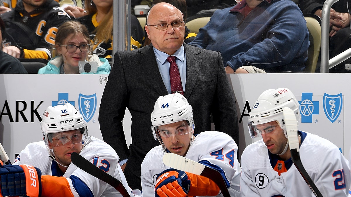 Barry Trotz of the New York Islanders looks on against the Pittsburgh Penguins at PPG PAINTS Arena on April 14, 2022 in Pittsburgh, Pennsylvania.