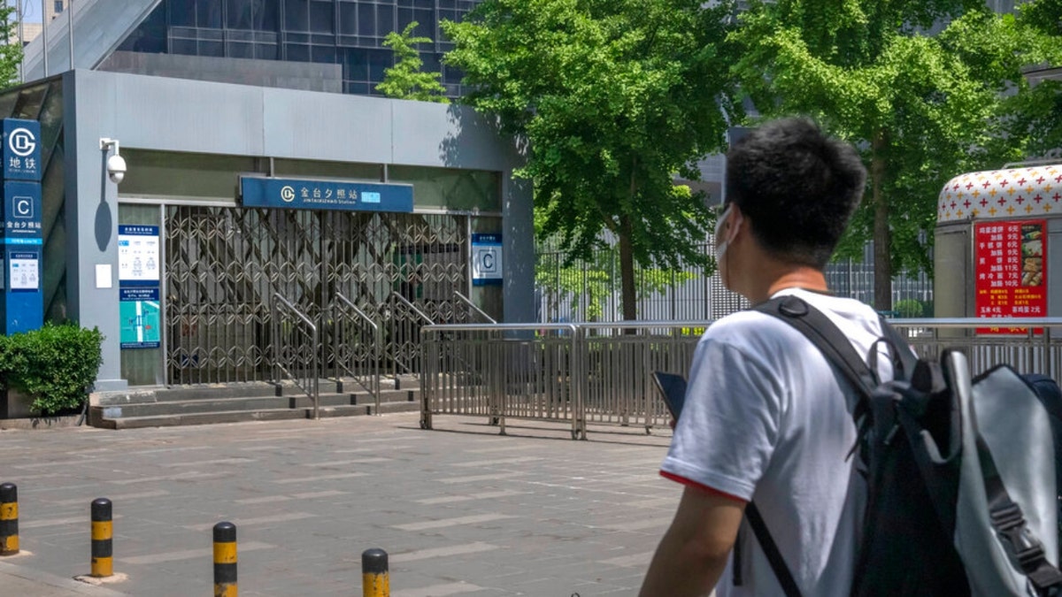 Man outside a Beijing subway
