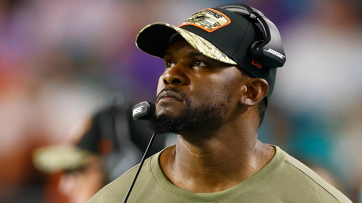  Brian Flores looks on during a Dolphins game