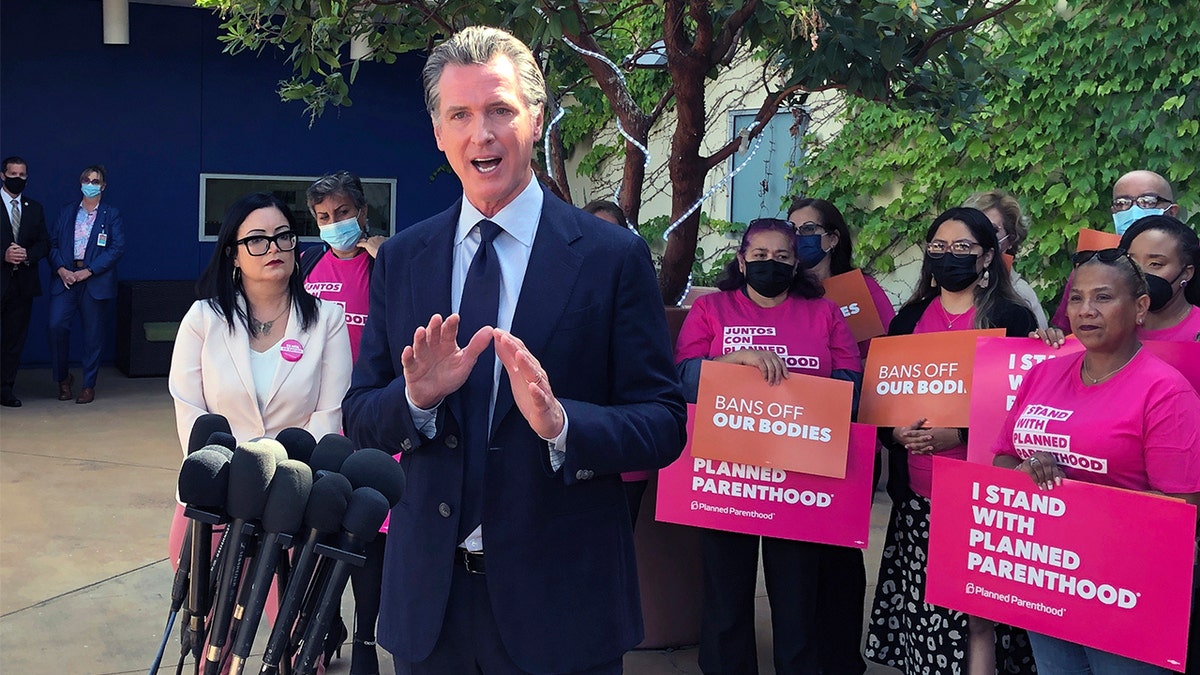 California Gov. Gavin Newsom talks at a news conference with workers and volunteers on Wednesday, May 4, 2022, at a Planned Parenthood office near downtown Los Angeles. (AP Photo/Michael R. Blood)