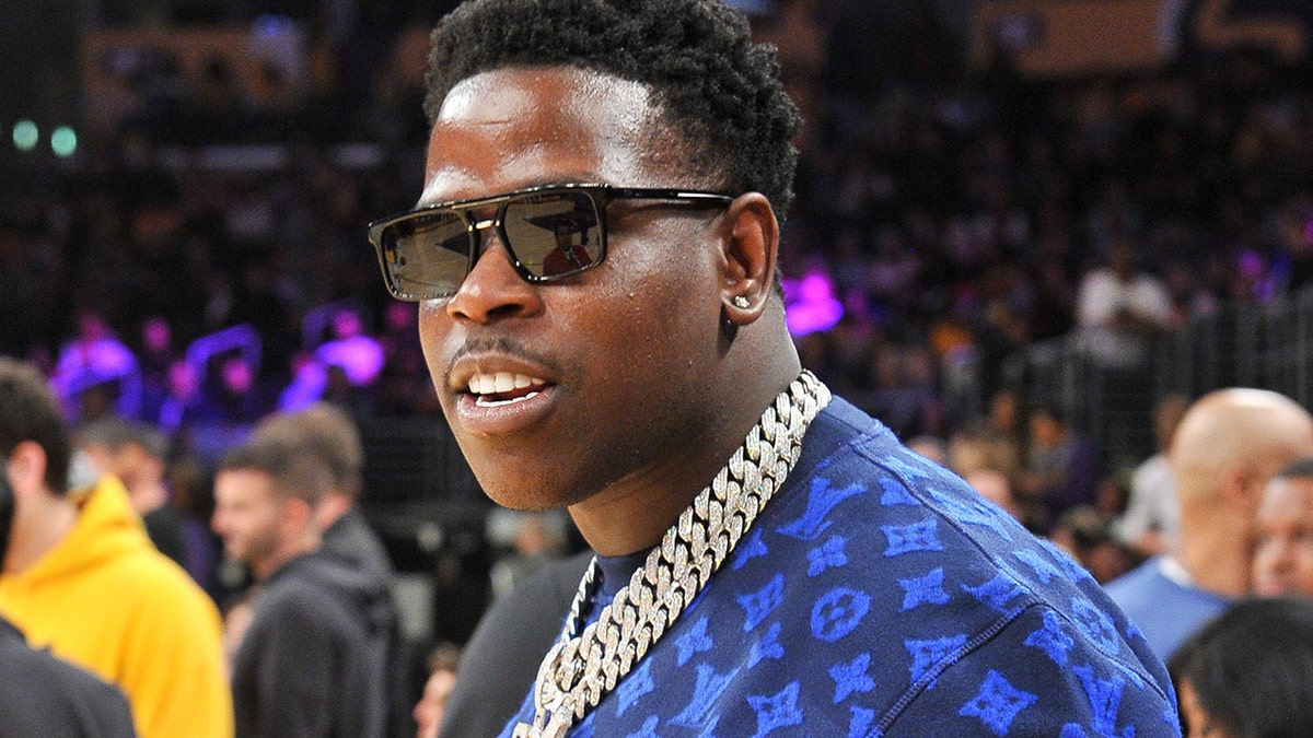 Rapper Casanova pleaded guilty Wednesday to federal drug and racketeering charges. He is pictured attending a basketball game between the Los Angeles Lakers and the Memphis Grizzlies at Staples Center on October 29, 2019, in Los Angeles, California.