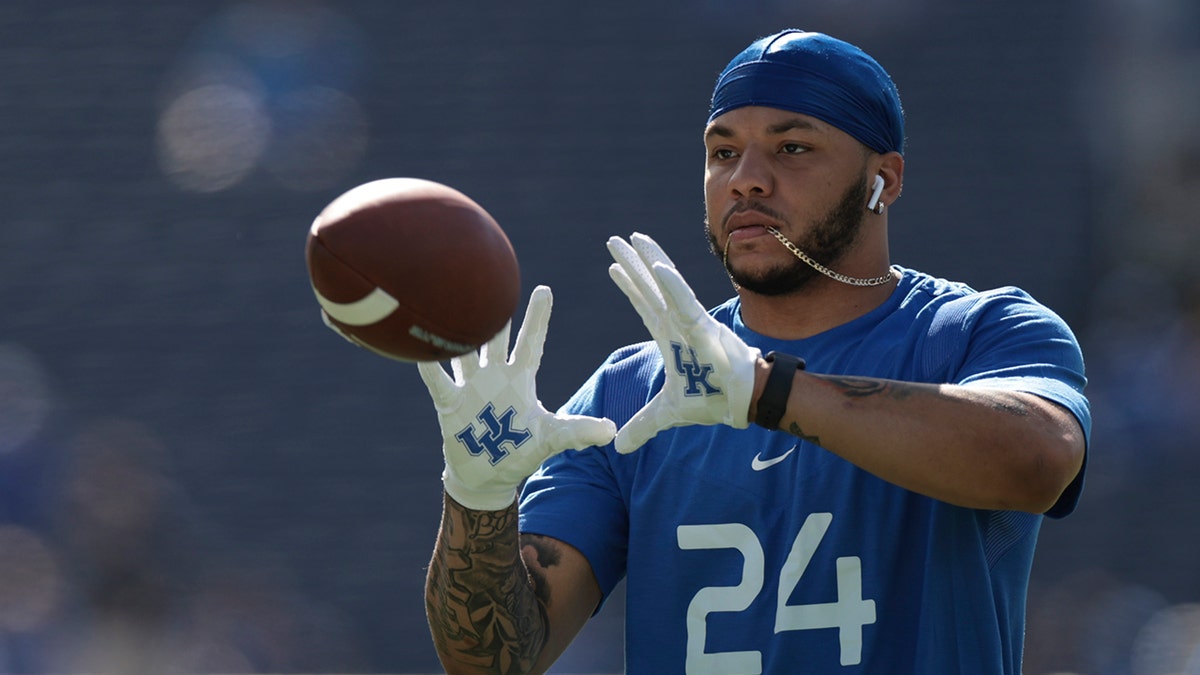 Chris Rodriguez Jr. #24 of the Kentucky Wildcats warms up prior to the game against the Iowa Hawkeyes in the Citrus Bowl at Camping World Stadium on January 01, 2022 in Orlando, Florida.