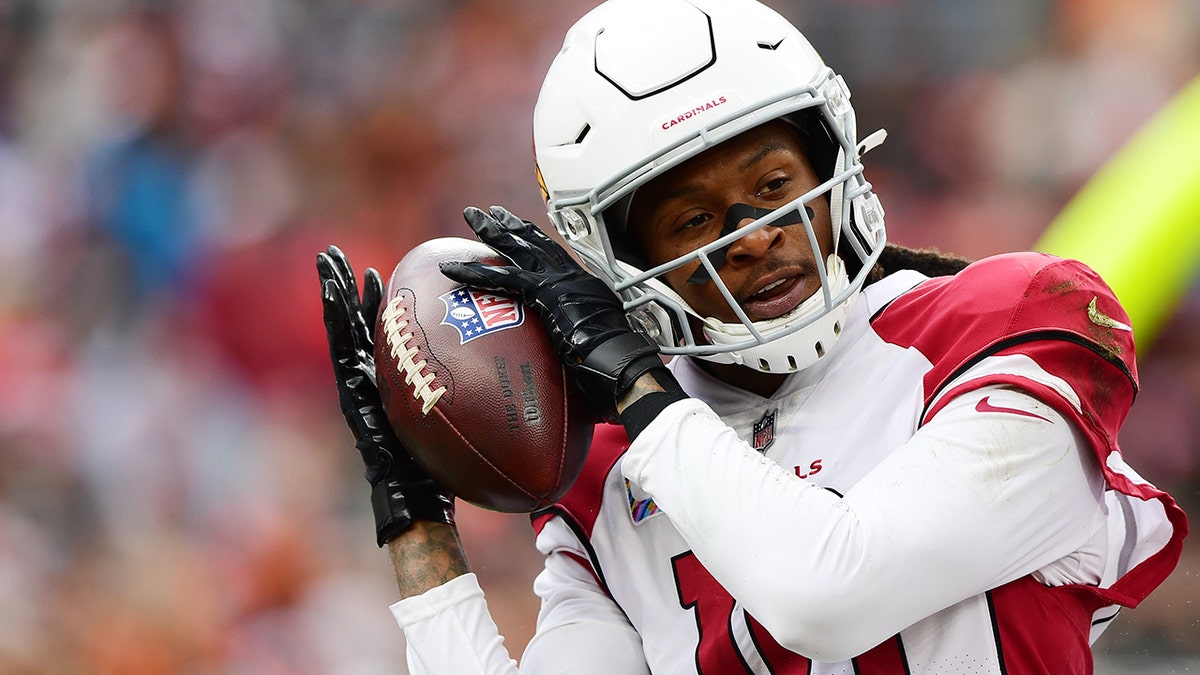 DeAndre Hopkins #10 of the Arizona Cardinals celebrates his touchdown during a game against the Cleveland Browns at FirstEnergy Stadium on October 17, 2021 in Cleveland, Ohio.