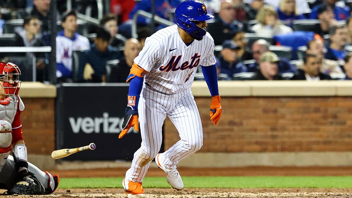 New York Mets' Dominic Smith (2) drops his bat after hitting an RBI-single to drive in Jeff McNeil and Pete Alonso against the Philadelphia Phillies during the fifth inning of a baseball game, Sunday, May 1, 2022, in New York.