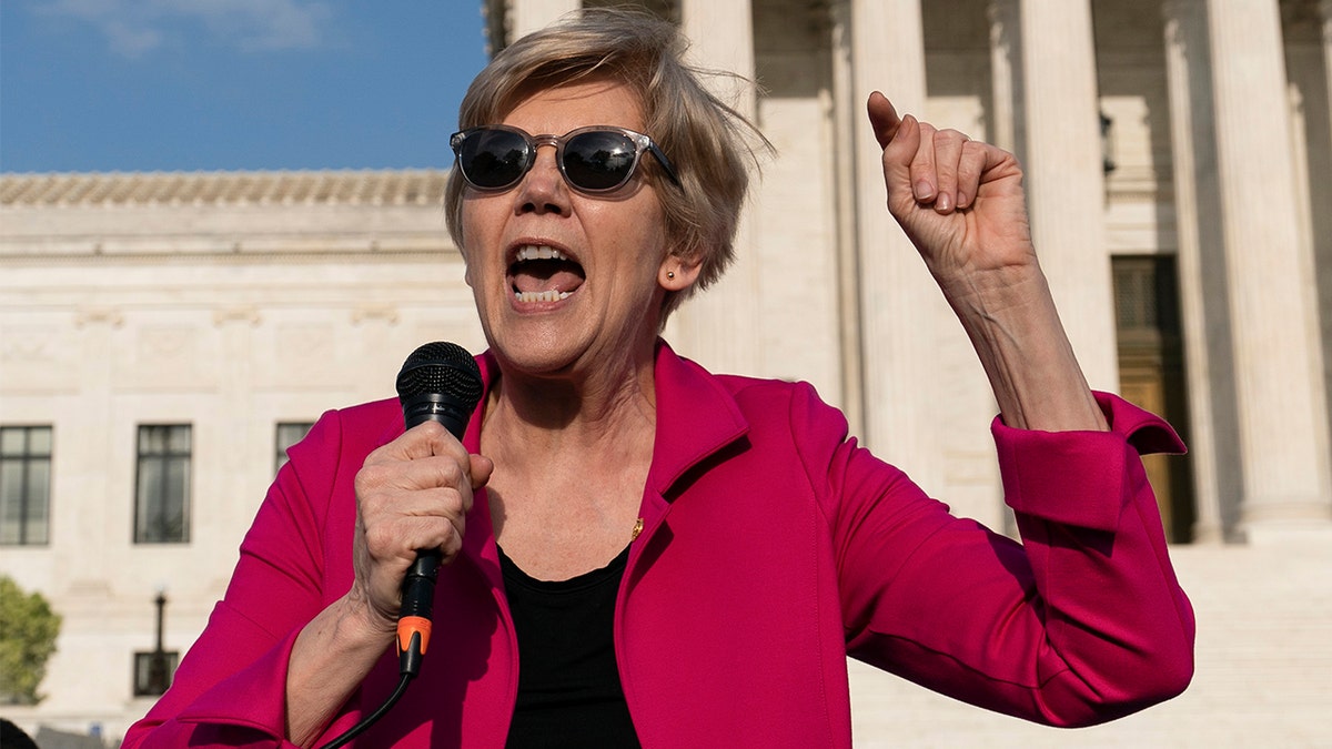 Sen. Elizabeth Warren, D-Mass., speaks during a protest outside of the U.S. Supreme Court Tuesday, May 3, 2022 in Washington. (AP Photo/Alex Brandon)