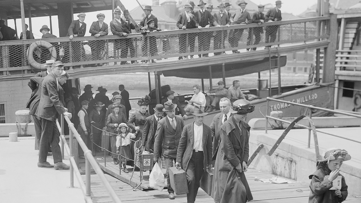 Immigrants arrive at Ellis Island NYC