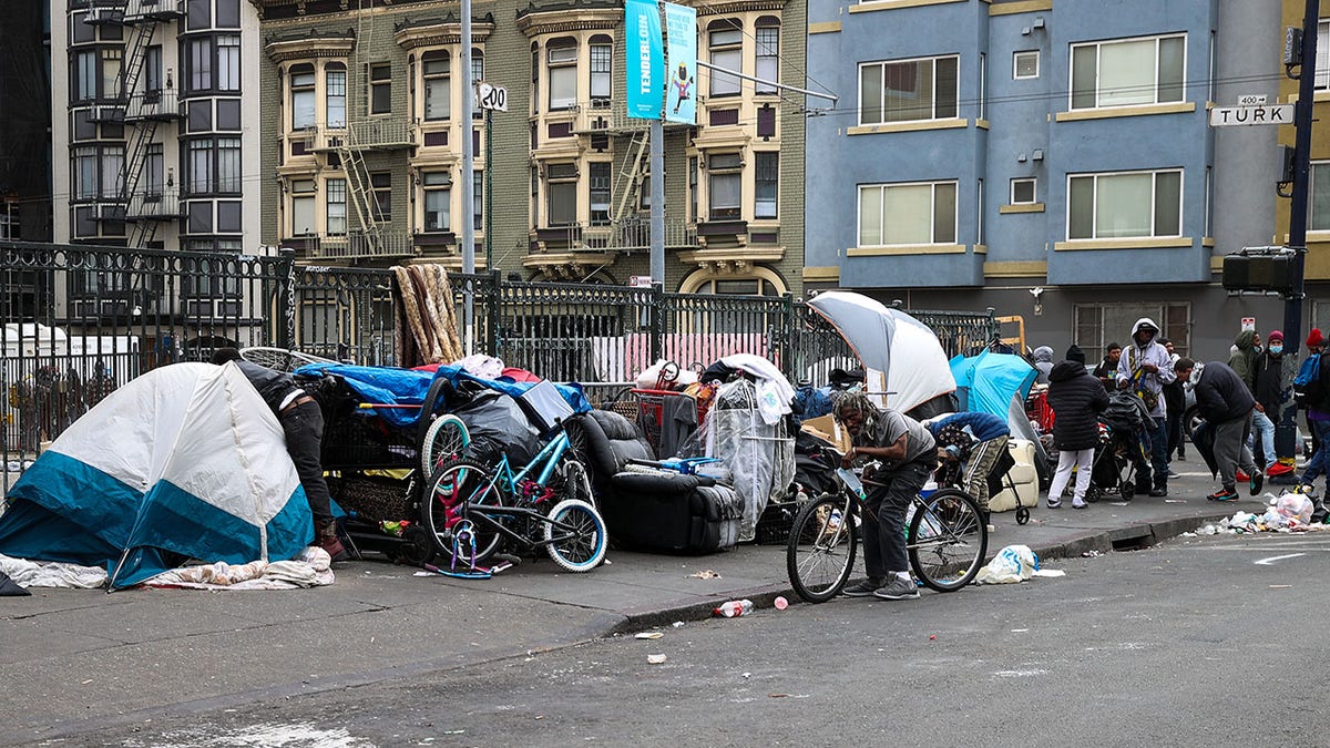 Homeless people on streets of the Tenderloin district in San Francisco.
