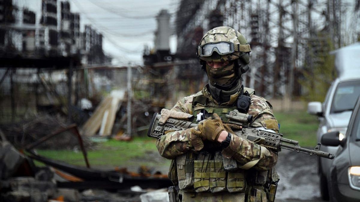 Russian soldier stands guard