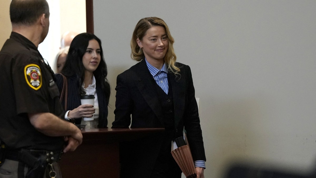Amber Heard enters the courtroom at the Fairfax County Circuit Court in Fairfax, Virginia, on May 3, 2022.