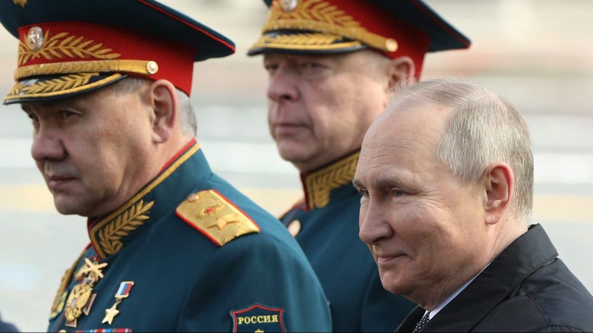 Vladimir Putin and Sergei Shoigu