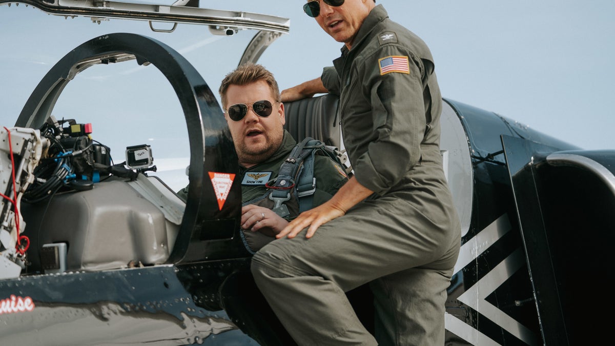 Tom Cruise and James Corden suit up for a flight