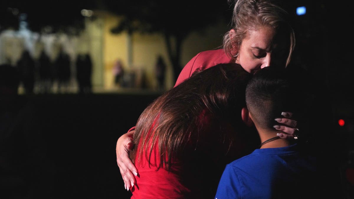 Family hugs Uvalde, Texas school shooting