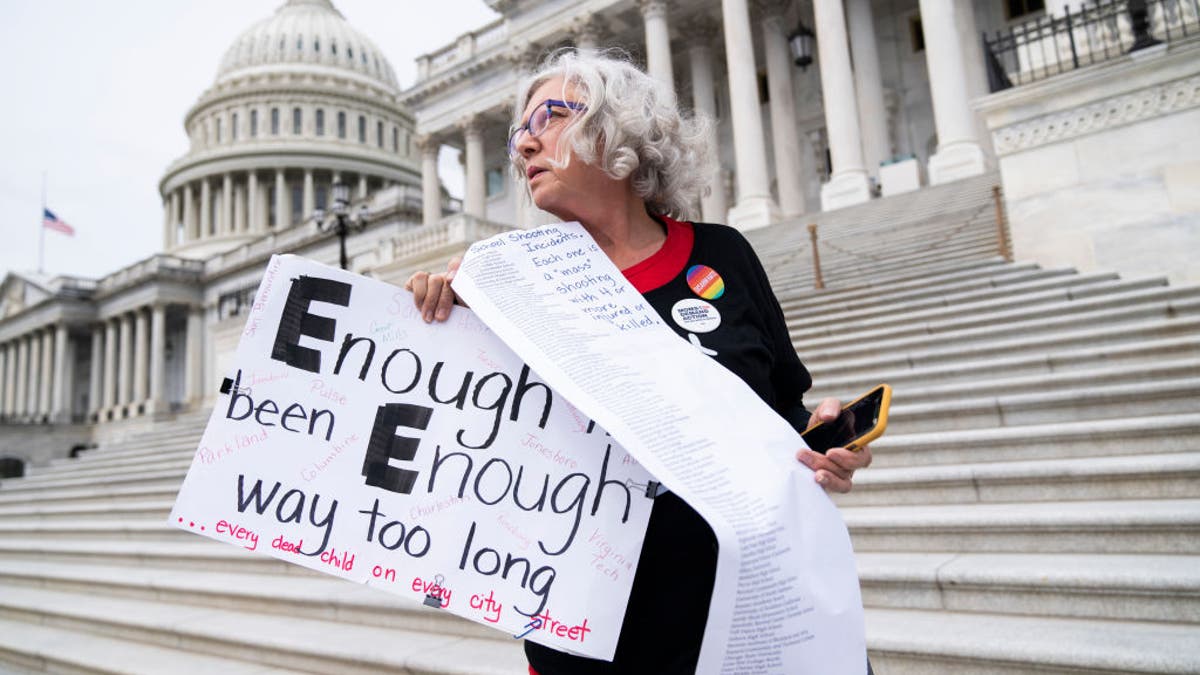 Gun control protester on the steps of the U.S. Capitol