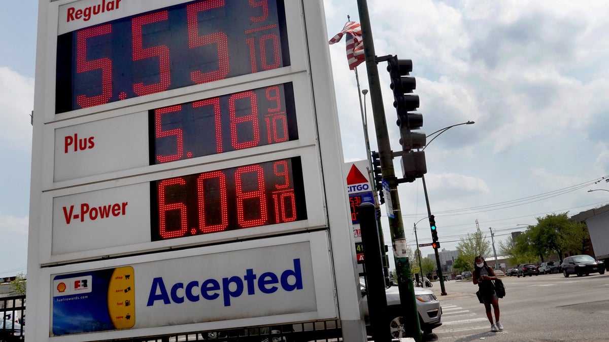 A sign displays gas prices at a gas station on May 10, 2022 in Chicago, Illinois. Nationwide, the average price for a gallon of regular gasoline reached a record high today of $4.37 a gallon.