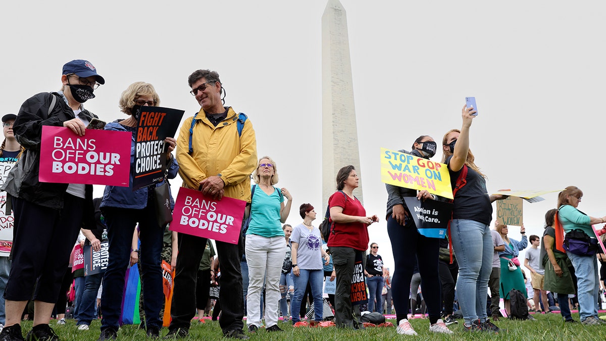 WASHINGTON, DC - MAY 14: Abortion rights activists participate in a Bans Off Our Bodies rally on May 14, 2022 in Washington, DC. Abortion rights supporters are holding rallies around the country urging lawmakers to affirm abortion rights into law after a leaked draft from the U.S. Supreme Court exposed a potential decision to overturn Roe v. Wade. (Photo by Tasos Katopodis/Getty Images)