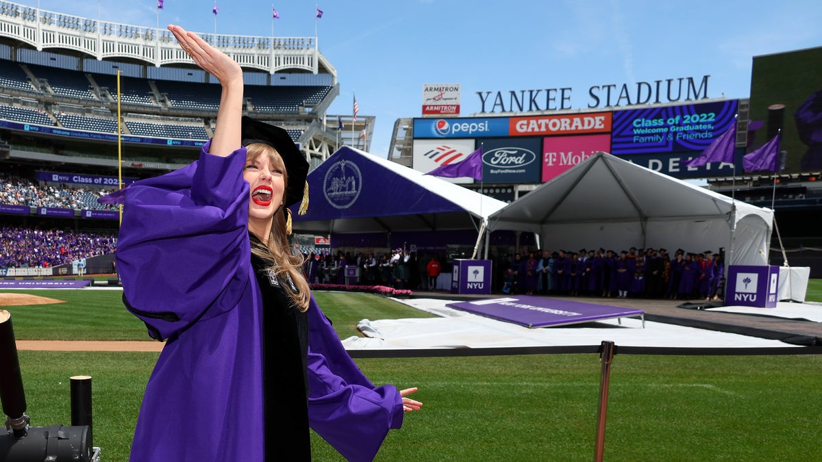Taylor Swift waving to students in Yankee Stadium
