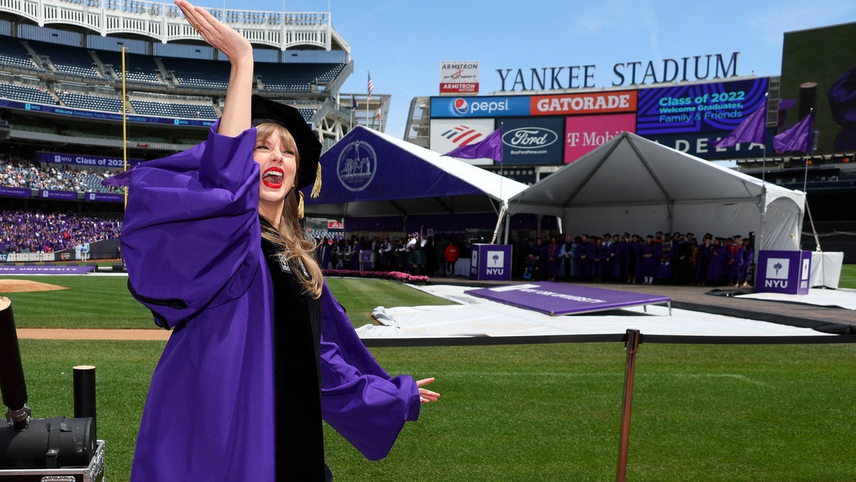 Taylor Swift waving to students in Yankee Stadium