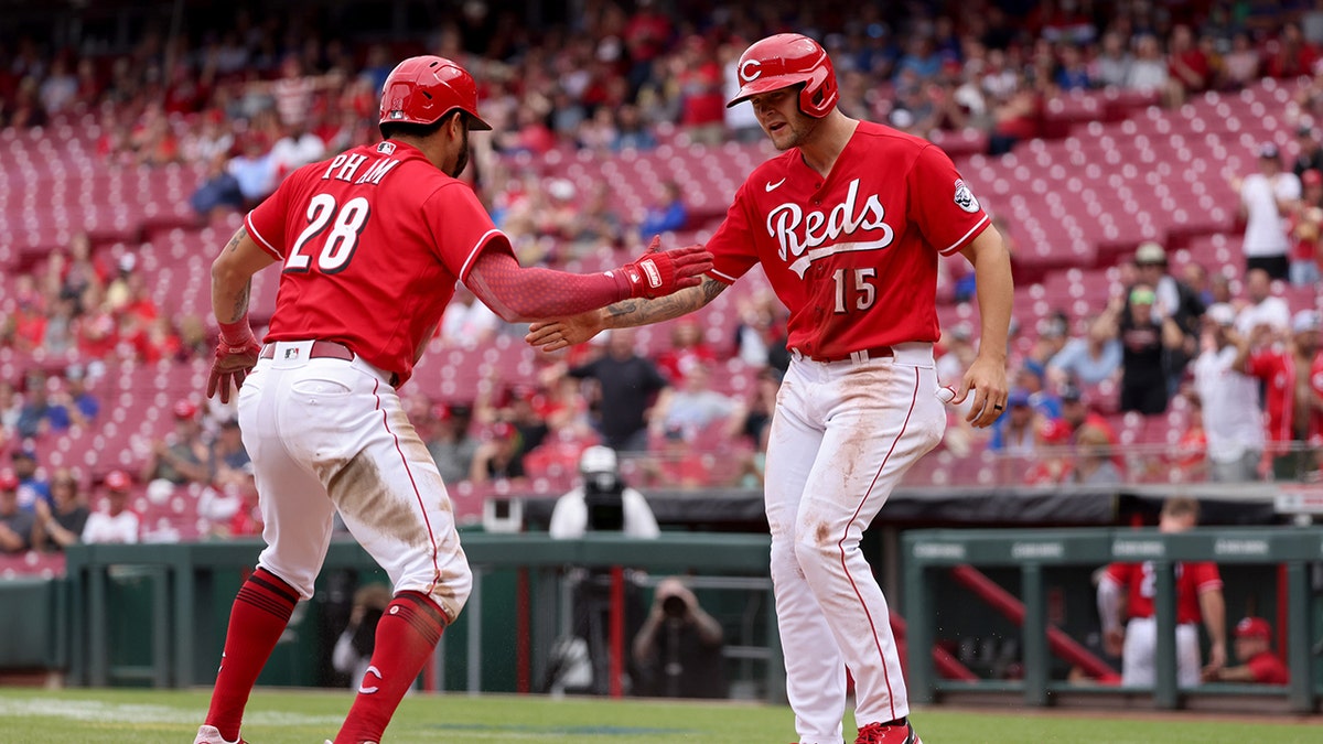 Reds score 20 runs in win over Cubs, most since 1999
