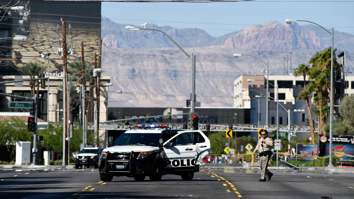 Las Vegas police investigate a side street near the Las Vegas Village after a lone gunman opened fire on the Route 91 Harvest country music festival on October 2, 2017 in Las Vegas, Nevada. 