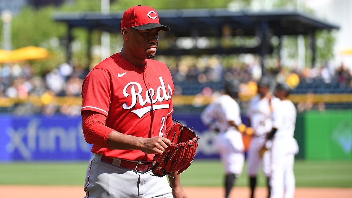 Hunter Greene #21 of the Cincinnati Reds walks to the dugout after being removed with a no-hitter still intact in the eighth inning during the game against the Pittsburgh Pirates at PNC Park on May 15, 2022 in Pittsburgh, Pennsylvania.