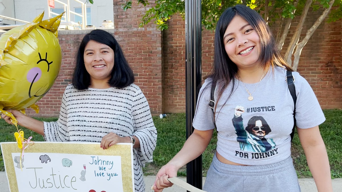 A Johnny Depp fan named Sofia wears a "#Justice for Johnny" t-shirt