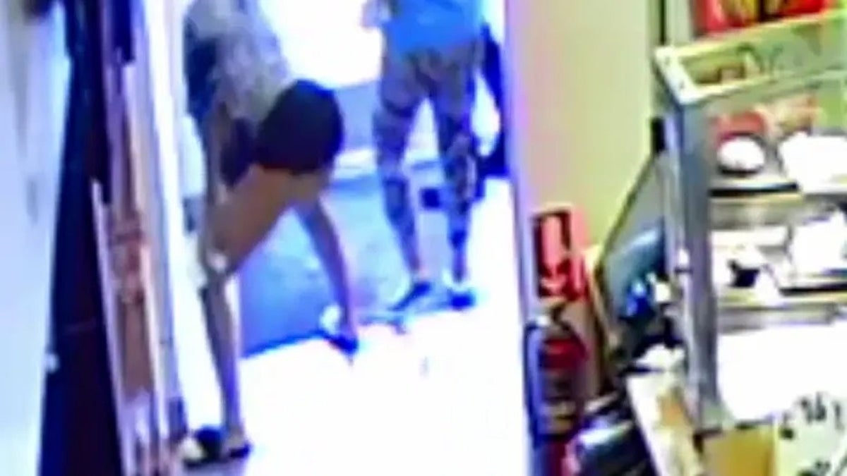 Tianis Jones twerks as she leaves the McDonald's