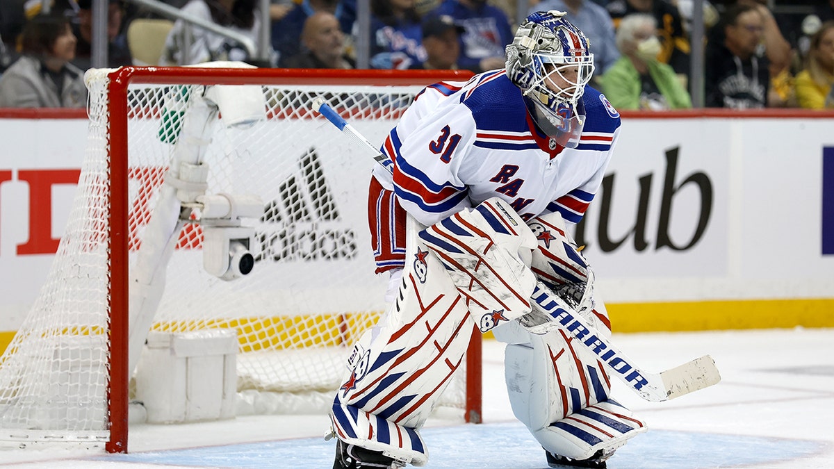 Igor Shesterkin #31 of the New York Rangers lines up for a face-off in Game Six of the First Round of the 2022 Stanley Cup Playoffs against the Pittsburgh Penguins at PPG PAINTS Arena on May 13, 2022 in Pittsburgh, Pennsylvania.