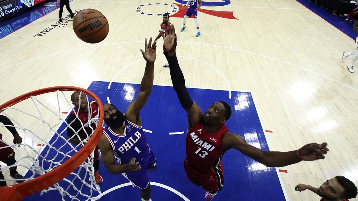James Harden #1 of the Philadelphia 76ers and Bam Adebayo #13 of the Miami Heat  in Game Six of the 2022 NBA Playoffs Eastern Conference Semifinals at Wells Fargo Center on May 12, 2022 in Philadelphia, Pennsylvania.