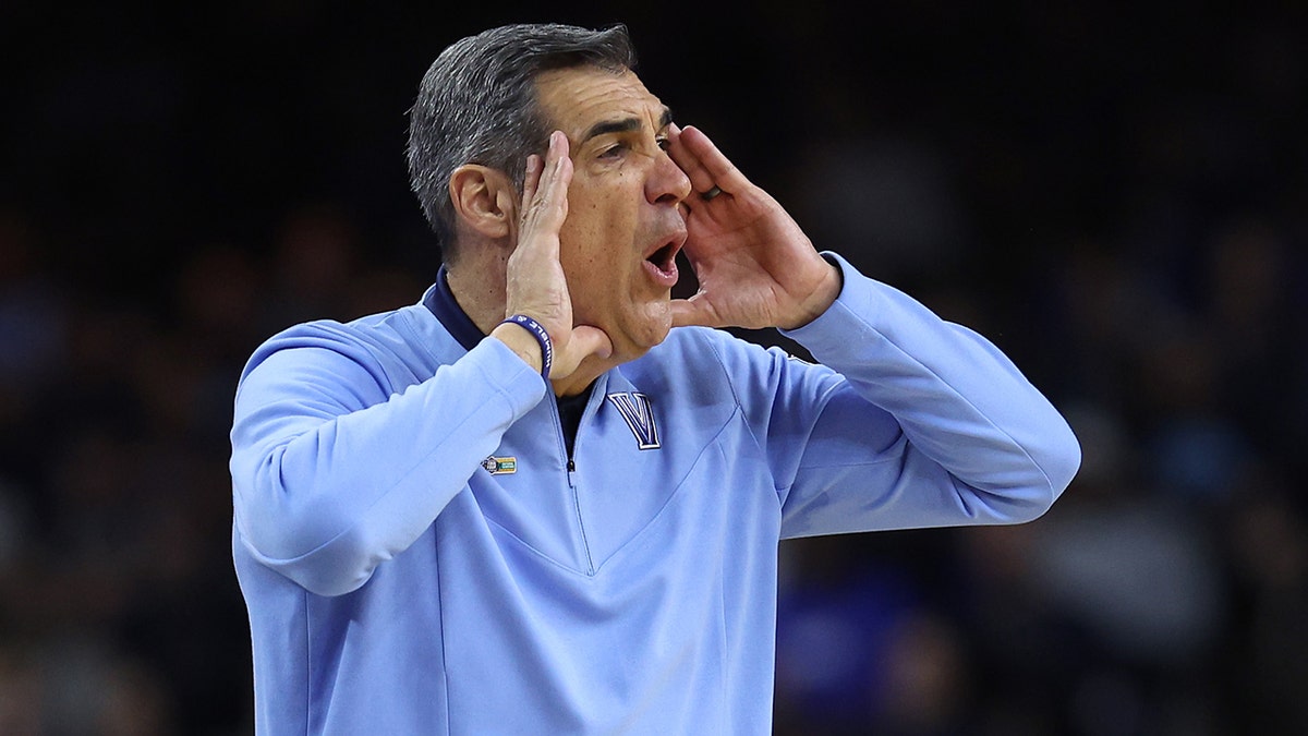 Head coach Jay Wright of the Villanova Wildcats looks on in the first half of the game against the Kansas Jayhawks during the 2022 NCAA Men's Basketball Tournament Final Four semifinal at Caesars Superdome on April 02, 2022 in New Orleans, Louisiana.