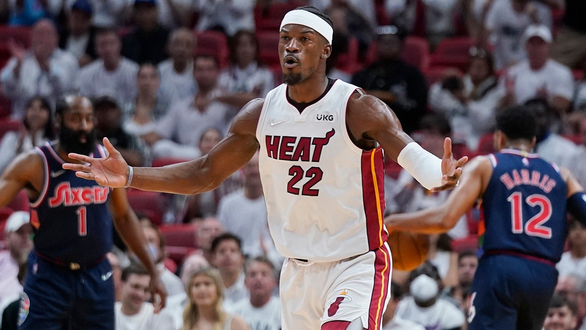 Miami Heat forward Jimmy Butler (22) celebrates after scoring during the first half of Game 5 of an NBA basketball second-round playoff series against the Philadelphia 76ers, Tuesday, May 10, 2022, in Miami.