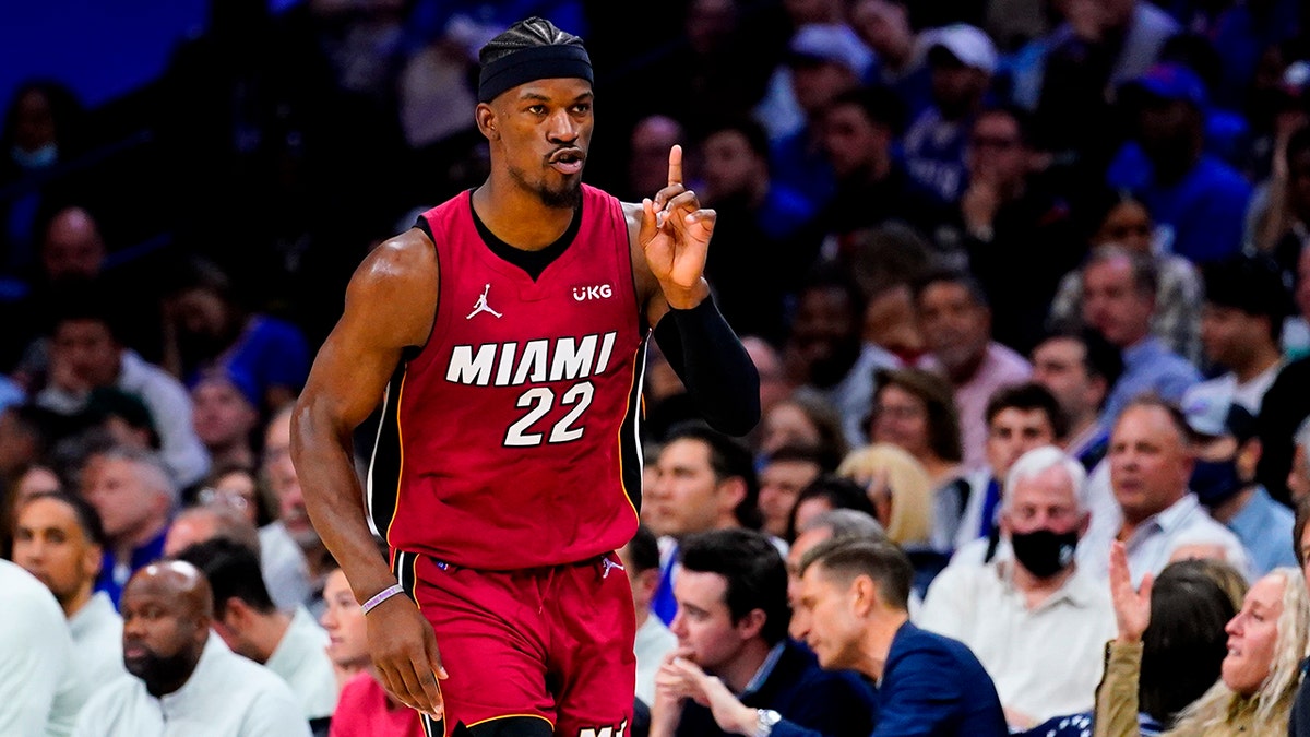 Miami Heat's Jimmy Butler gestures as he runs down the court during the second half of Game 6 of an NBA basketball second-round playoff series against the Philadelphia 76ers, Thursday, May 12, 2022, in Philadelphia. 