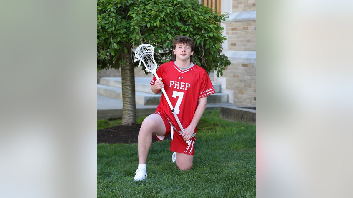 James McGrath seen in Fairfield College Preparatory School lacrosse uniform