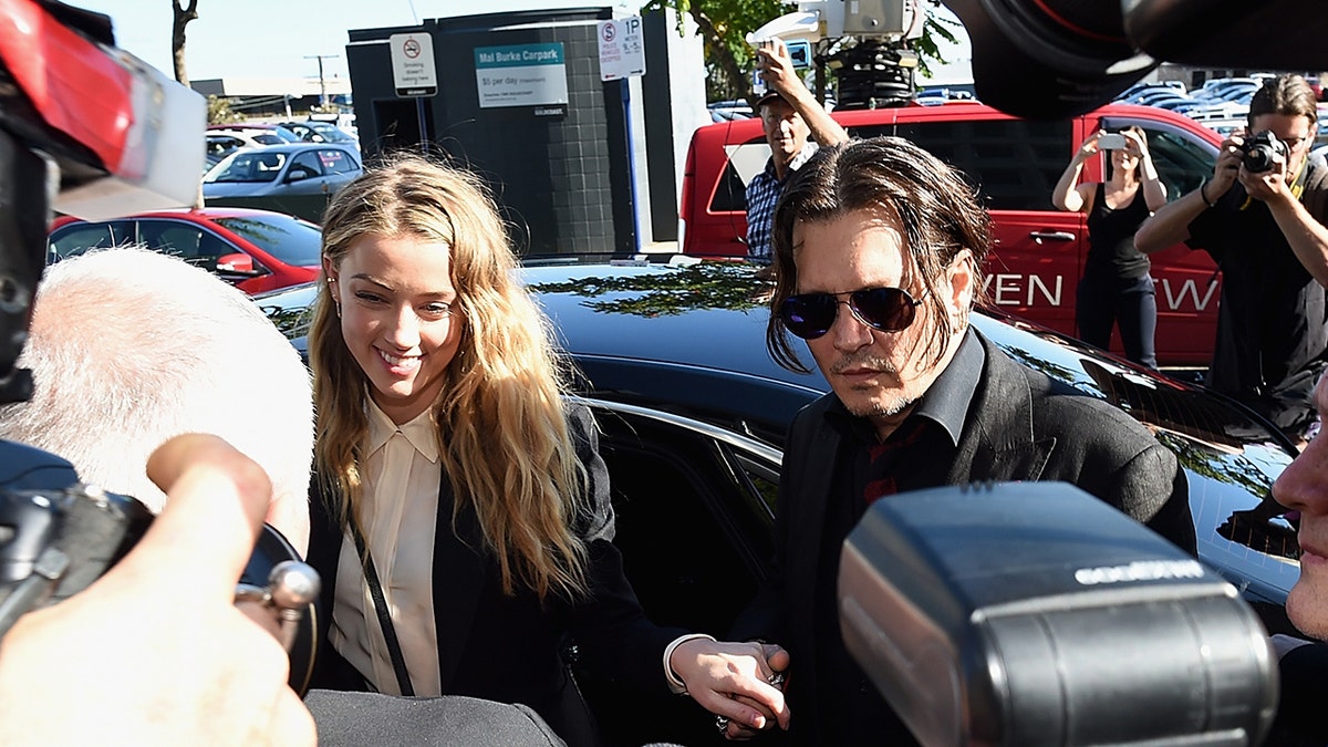 Johnny Depp Amber Heard arrive at Southport Magistrates Court in April 2016 