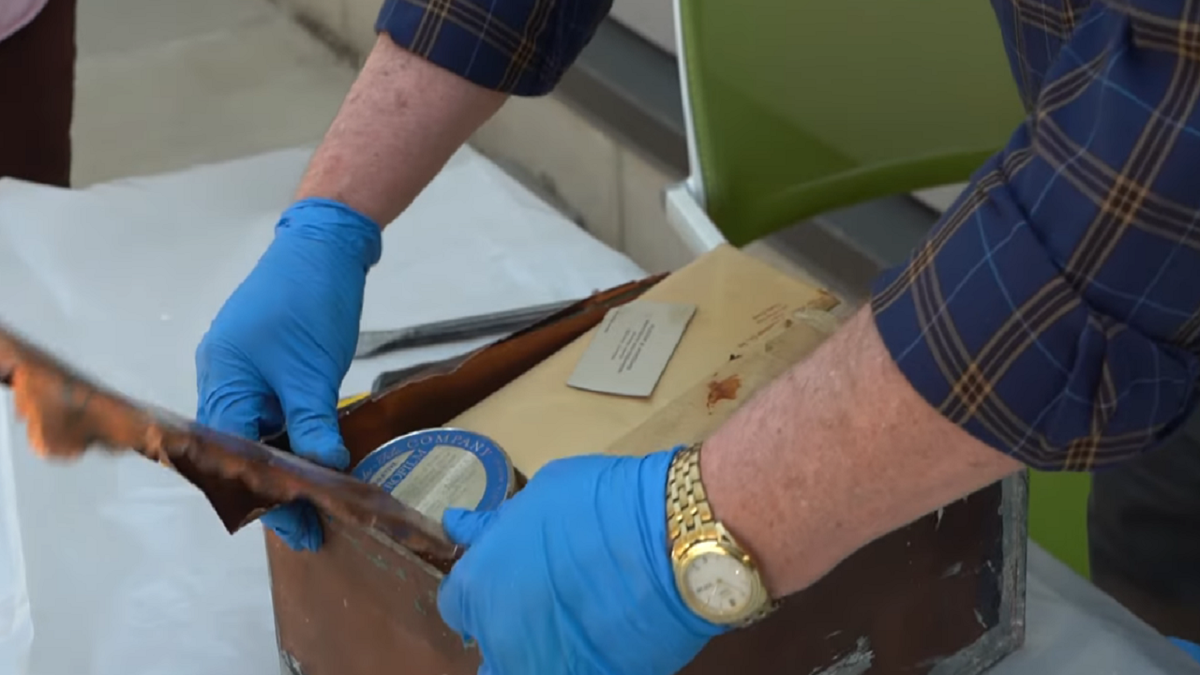 The time capsule was opened after being found inside an old courthouse building in Johnson County, Kan.