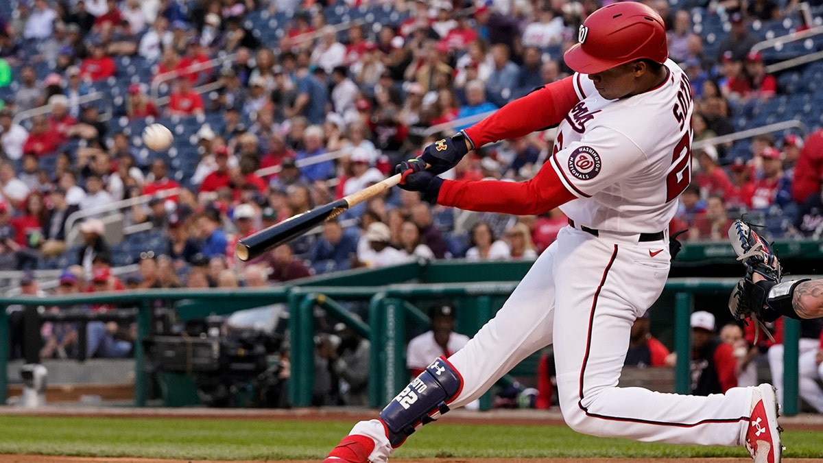 Washington Nationals' Juan Soto hits a two-run homer during the first inning of a baseball game against the New York Mets at Nationals Park, Wednesday, May 11, 2022, in Washington. 