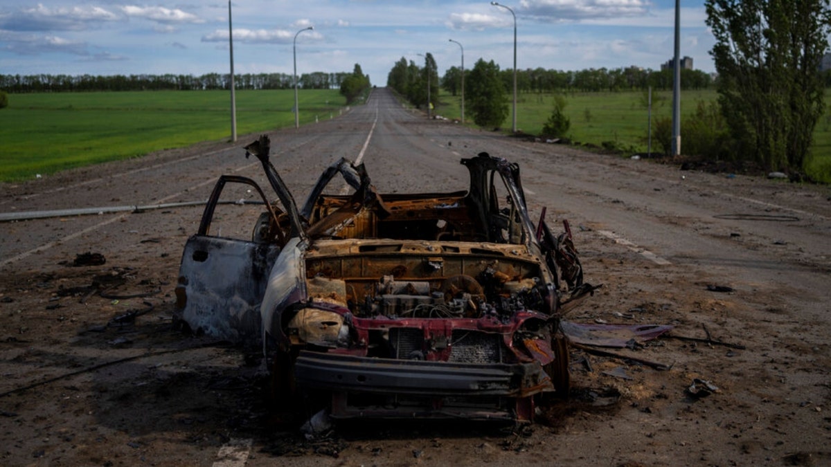 A destroyed vehicle in Kharkiv