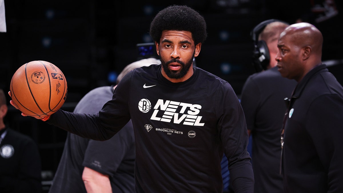 Kyrie Irving of Brooklyn Nets warms up before NBA playoffs between Brooklyn Nets and Boston Celtics at the Barclays Center in Brooklyn of New York City, United States on April 25, 2022. 
