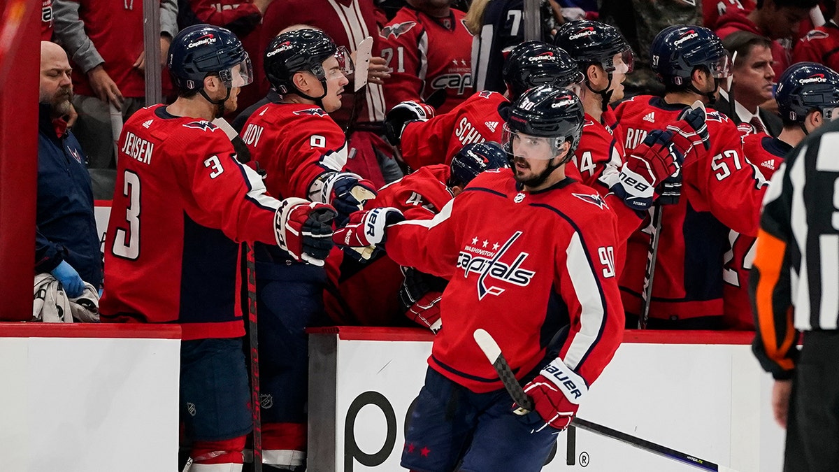 Washington Capitals left wing Marcus Johansson (90) celebrates his goal with his teammates during the second period of Game 3 in the first-round of the NHL Stanley Cup hockey playoffs against the Florida Panthers, Saturday, May 7, 2022, in Washington.