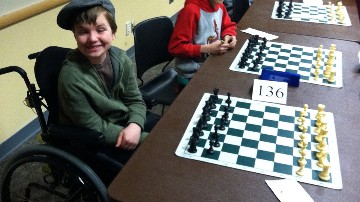 Griffin McConnell playing chess in 2014