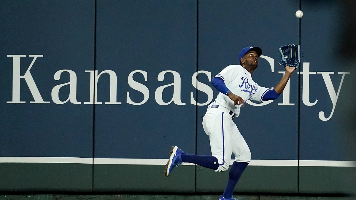 Kansas City Royals center fielder Michael A. Taylor catches a fly ball for the out on New York Yankees' Anthony Rizzo during the eighth inning of a baseball game Friday, April 29, 2022, in Kansas City, Mo.