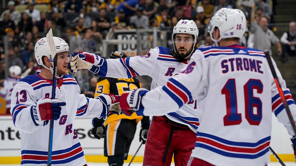New York Rangers center Mika Zibanejad (93) celebrates his first goal of the game during the second period in Game Six of the First Round in the 2022 NHL Stanley Cup Playoffs between the New York Rangers and the Pittsburgh Penguins on May 13, 2022, at PPG Paints Arena in Pittsburgh, PA.