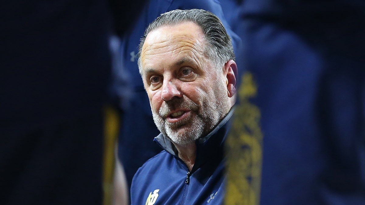 Notre Dame Fighting Irish head coach Mike Brey during a timeout during the college basketball game between Notre Dame Fighting Irish and Boston College Eagles on Dec. 3, 2021, at Conte Forum in Chestnut Hill, MA.