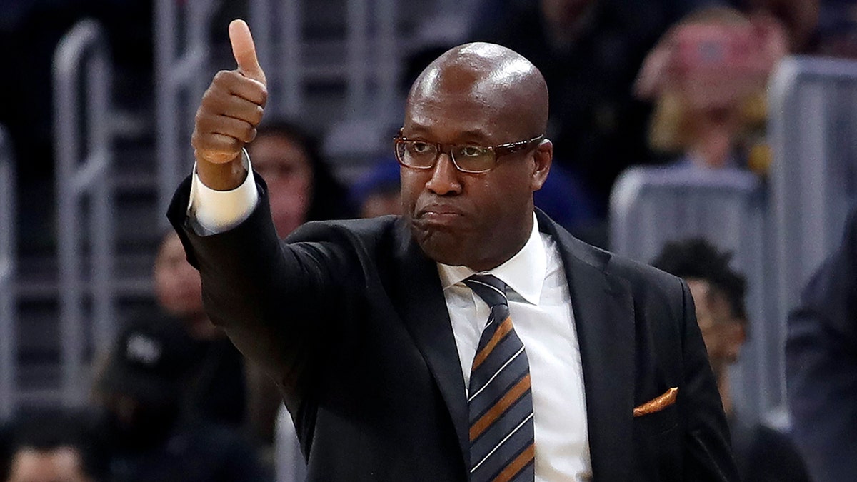 FILE - Golden State Warriors assistant coach Mike Brown gestures during an NBA basketball game against the Portland Trail Blazers in San Francisco, Nov. 4, 2019. 
