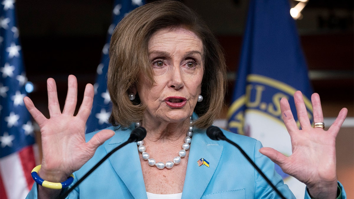 House Speaker Nancy Pelosi answers questions from reporters during a press conference