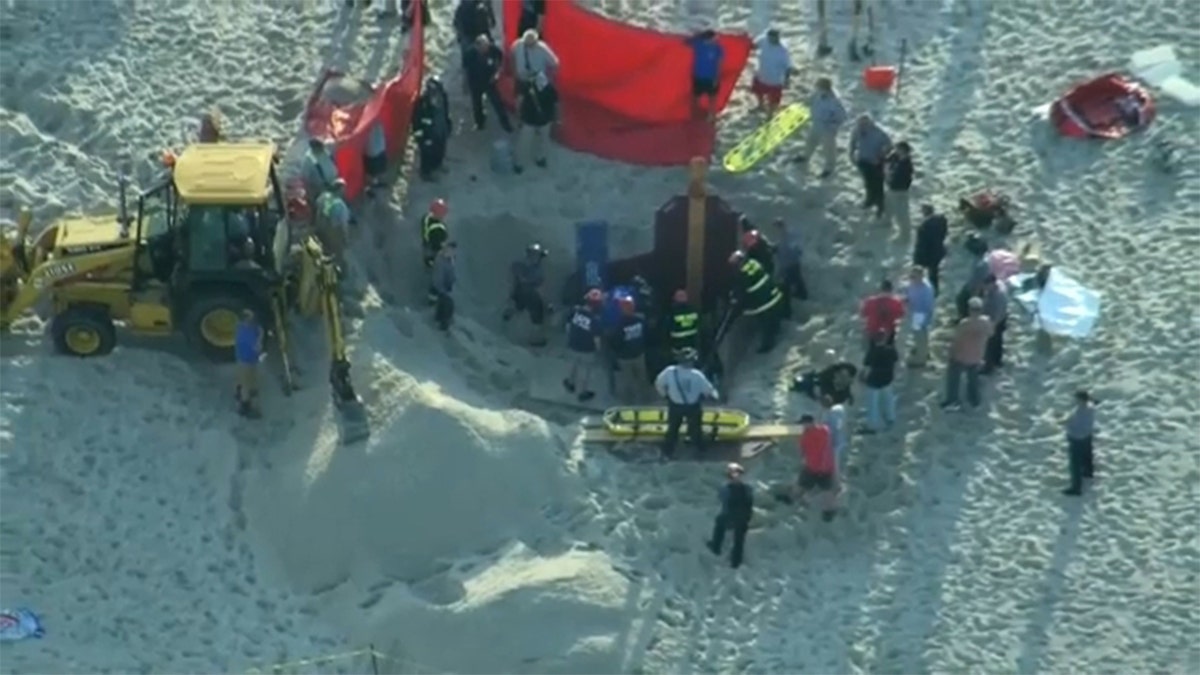 A teen digging on a New Jersey beach died Tuesday, and his younger sister was rescued after police say both out-of-towners became trapped beneath the sand when the hole collapsed on top of them.