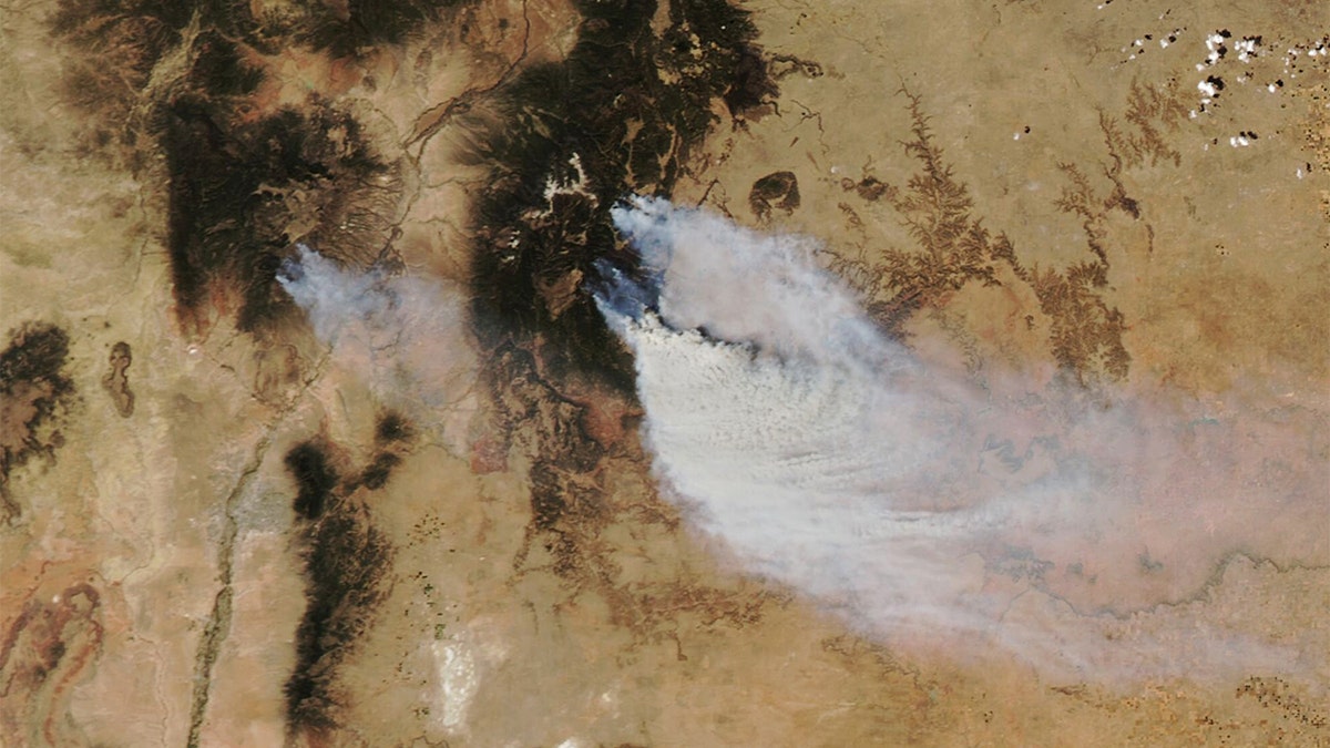 A NASA satellite captured an image of wildfires burning in New Mexico, May 3, 2022.