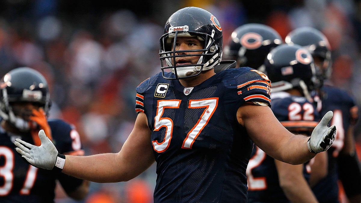 Olin Kreutz #57 of the Chicago Bears complains to a referee during a game against the St. Louis Rams at Soldier Field on December 6, 2009 in Chicago, Illinois. The Bears defeated the Rams 17-9.