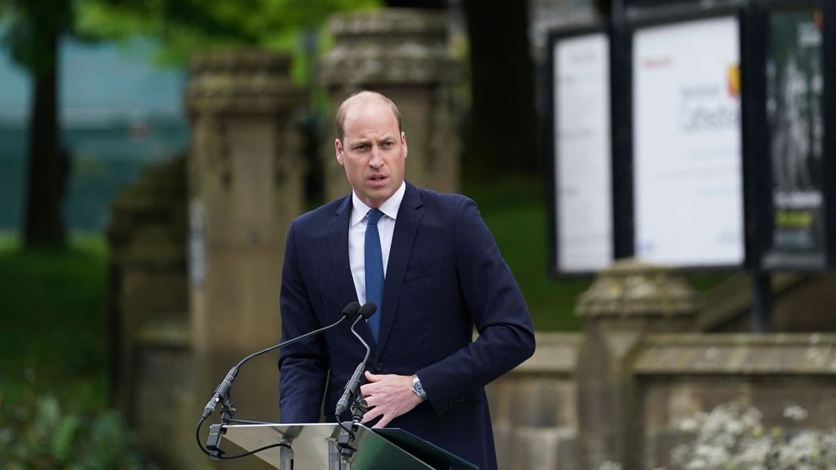Britain's Prince William gives a speech as he and his wife Kate the Duchess of Cambridge attend the launch of the Glade of Light Memorial, outside Manchester Cathedral, which commemorates the victims of a suicide bomb attack at a 2017 Ariana Grande concert, in Manchester, England, Tuesday, May 10, 2022. The memorial honours the 22 people whose lives were taken, as well as remembering everyone who was left injured or affected by the attack at Manchester Arena on May 22, 2017.