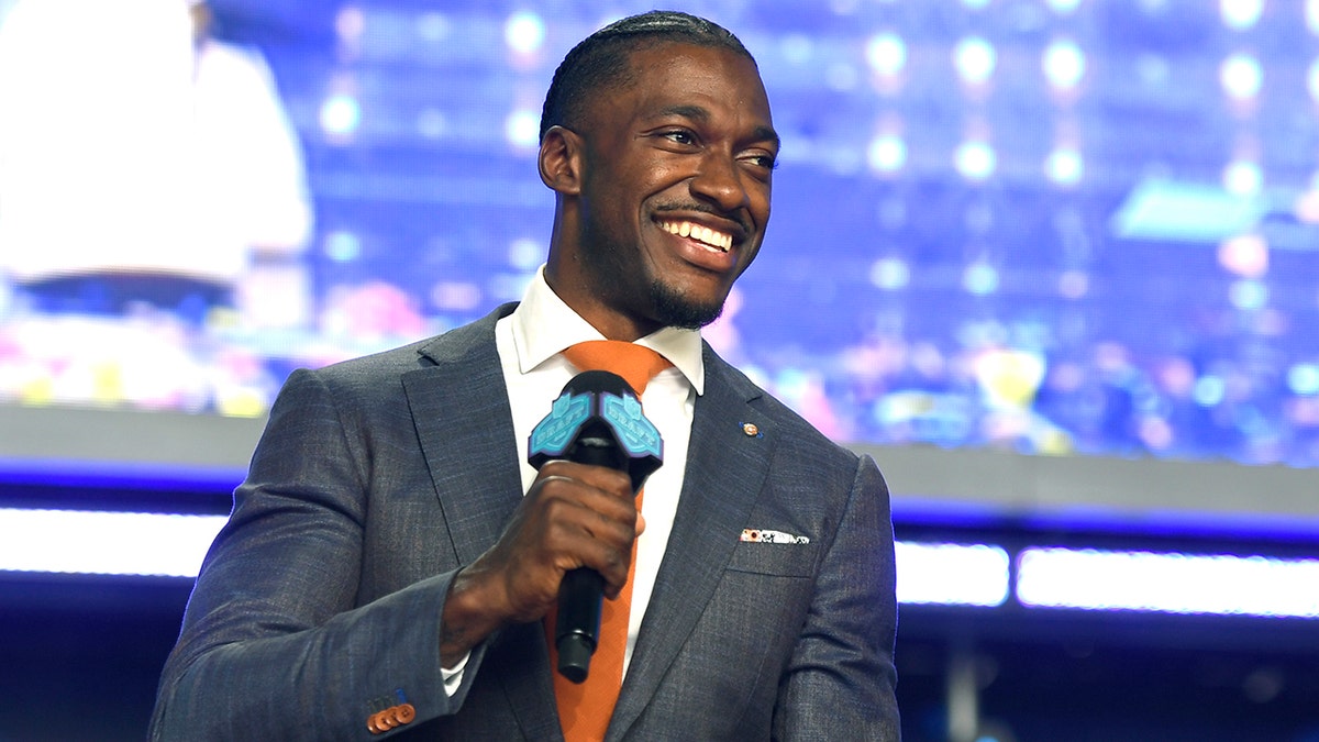 Robert Griffin III speaks onstage during round four of the 2022 NFL Draft on April 30, 2022 in Las Vegas, Nevada.